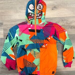 Volcom Smasher Jacket with an abstract full-hooded face design.
